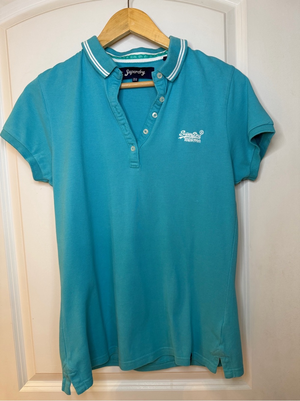 Superdry women’s Teal and white Polo Shirt, size US 10/ UK 14
